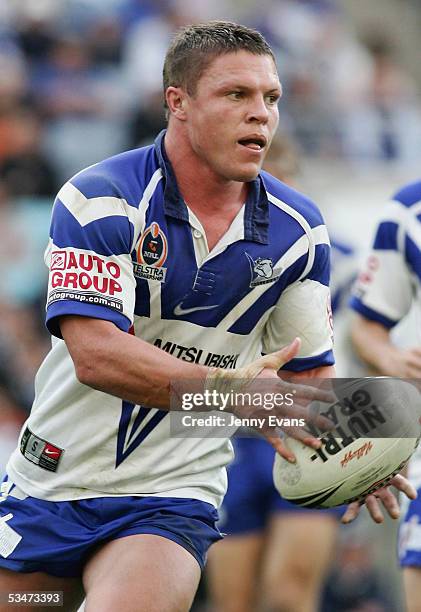 Corey Hughes of the Bulldogs in action during the round 25 NRL match between the Bulldogs and the Penrith Panthers held at Telstra Stadium on August...