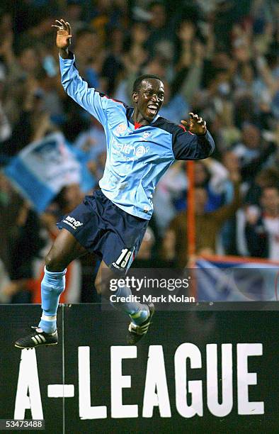 Dwight Yorke celebrates scoring a goal during the round one A-League match between the Sydney FC and Melbourne Victory at Aussie Stadium on August...