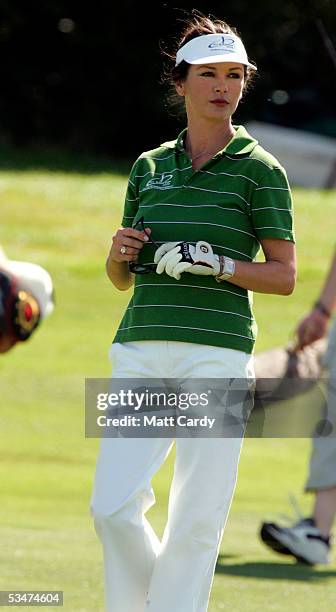 Celebrity golfer Catherine Zeta-Jones competes in the All-Star Cup Celebrity Golf tournament at the Celtic Manor Resort August 28, 2005 Newport,...