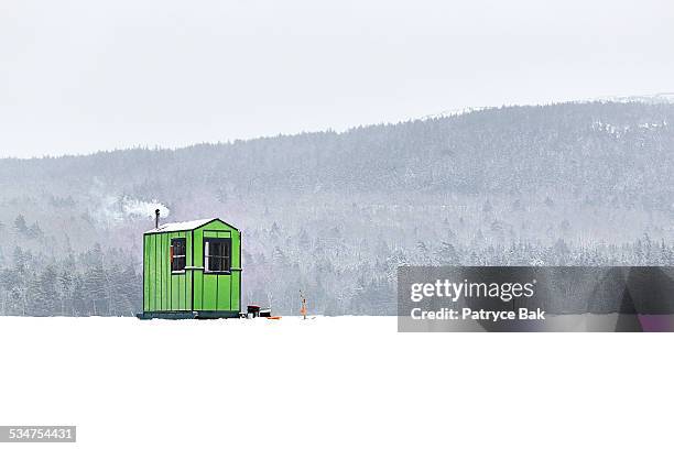 shack for ice fishing in maine - ice fishing stock pictures, royalty-free photos & images