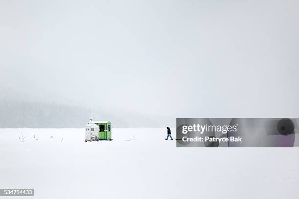 shack for ice fishing in maine - ice fishing stock pictures, royalty-free photos & images