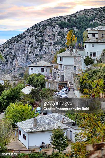 greek style stone house on the mountain - volos stock-fotos und bilder