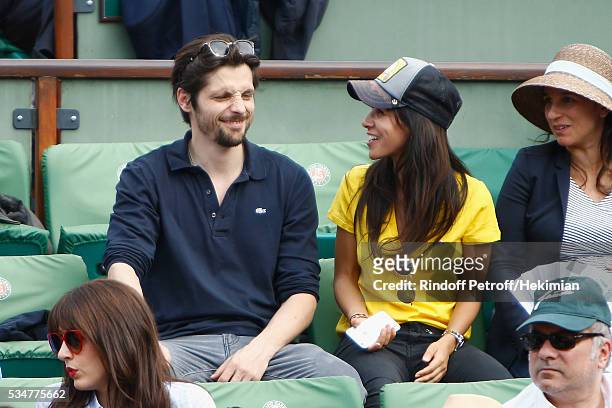 Raphael Personnaz and Reem Kherici attend the French Tennis Open Day 6 at Roland Garros on May 27, 2016 in Paris, France.
