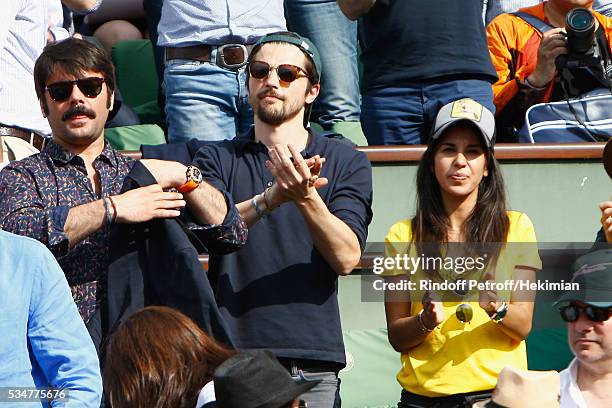 Raphael Personnaz and Reem Kherici attend the French Tennis Open Day 6 at Roland Garros on May 27, 2016 in Paris, France.