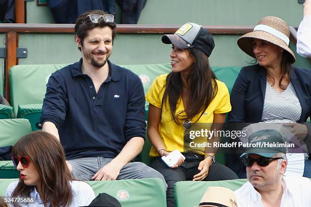 Raphael Personnaz and Reem Kherici attend the French Tennis Open Day 6 at Roland Garros on May 27, 2016 in Paris, France.