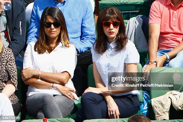 Nolwenn Leroy and Karine Ferri attend the French Tennis Open Day 6 at Roland Garros on May 27, 2016 in Paris, France.