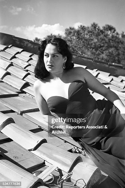 Greek-born Italian actress Yvonne Sanson posing on the roof of her house. 1951