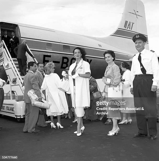 Greek-born Italian actress Yvonne Sanson leaving for Greece from Ciampino airport. Rome, 1957