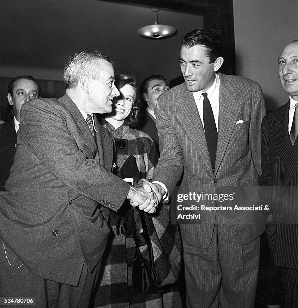 American actor Gregory Peck meeting American director William Wyler at the theatre, Rome, 1957