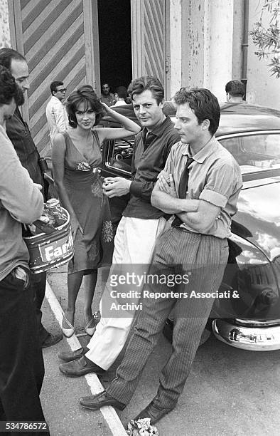 Italian actor Marcello Mastroianni visiting the film set of Bad Girls Don't Cry together with French actor Jean-Claude Brialy, Italian director Mauro...