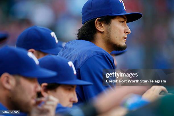 Texas Rangers starting pitcher Yu Darvish, top right, watches from the dugout in the first inning against the Pittsburgh Pirates at Globe Life Park...