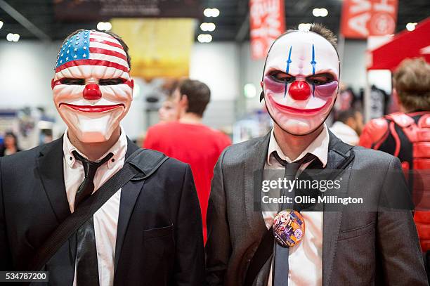 Cosplay enthusiasts in character as Thugs from The Purge on Day 1 of MCM London Comic Con at The London ExCel on May 27, 2016 in London, England.