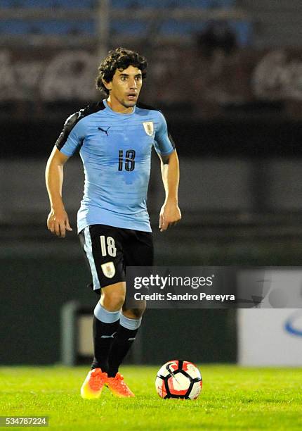 Mathias Corujo of Uruguay drives the ball during an international friendly match between Uruguay and Trinidad & Tobago at Centenario Stadium on May...