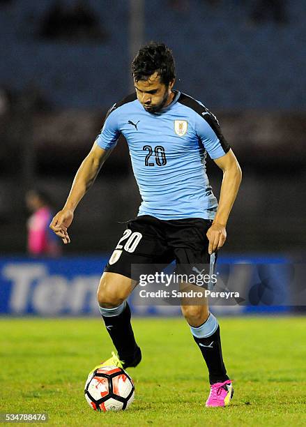 Alvaro Gonzalez of Uruguay drives the ball during an international friendly match between Uruguay and Trinidad & Tobago at Centenario Stadium on May...