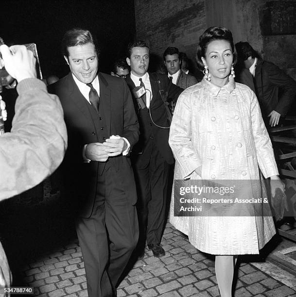 Italian actor Marcello Mastroianni attending an awarding ceremony at Castel Sant'Angelo with his wife Flora Carabella. Rome, 1972