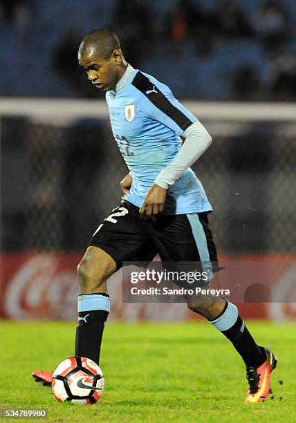 Diego Rolan of Uruguay drives the ball during an international friendly match between Uruguay and Trinidad & Tobago at Centenario Stadium on May 27,...