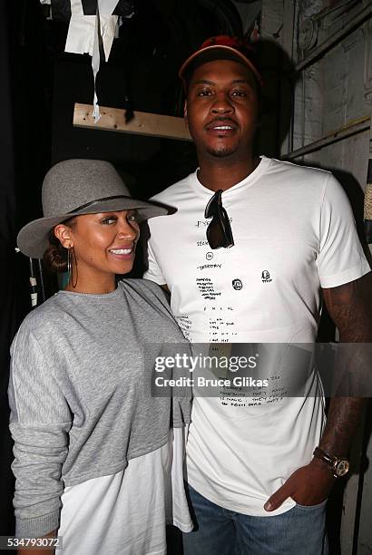 La La Anthony and Carmello Anthony pose backstage at the hit play "Eclipsed" on Broadway at The Golden Theatre on May 27, 2016 in New York City.