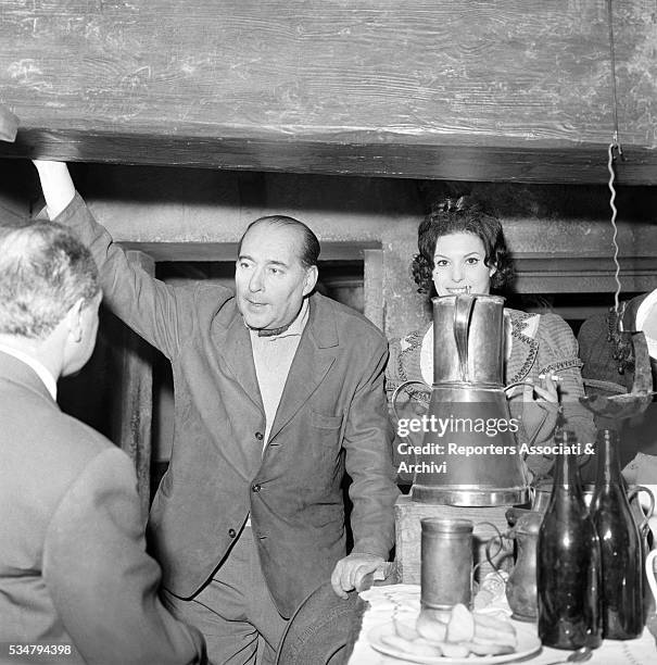 Italian director Roberto Rossellin and American actress and soprano Anna Moffo attending a party held for the film The Betrayer. 1961