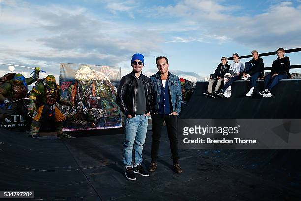 Will Arnett and Stephen Amell pose at Bondi beach during a photo call ahead of the Australian premiere of Teenage Mutant Ninja Turtles 2 on May 28,...