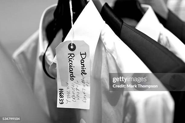 Image has been converted to black and white. The clothes ready for Daniel Ricciardo of Australia and Red Bull Racing at the Amber Lounge fashion show...