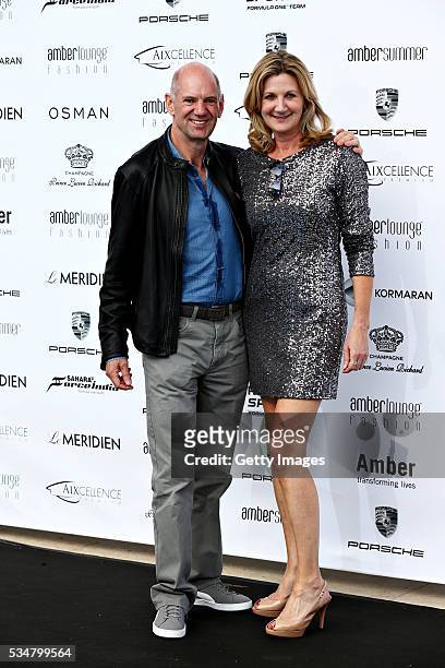 Adrian Newey, the Chief Technical Officer of Red Bull Racing arrives at the Amber Lounge fashion show with Louise Goodman, TV presenter, during...