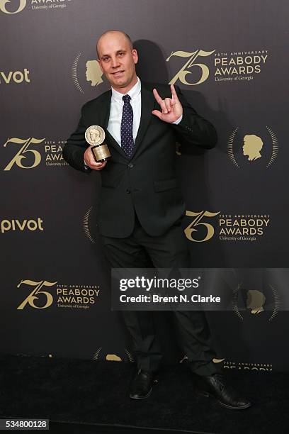 Official recipient for "Do Not Track", director Brett Gaylor poses for photographs in the press room during the 75th Annual Peabody Awards Ceremony...