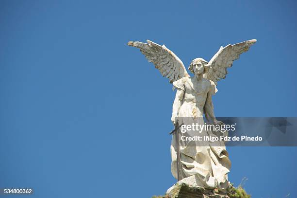 exterminating angel- comillas- cantabria- spain - angel statue stock-fotos und bilder