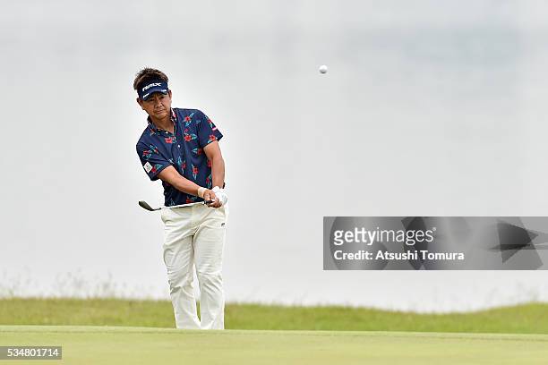 Hiroyuki Fujita of Japan chips onto the 18th green during the 3rd round of the Mizuno Open at JFE Setonaikai Golf Club on May 28, 2016 in Okayama,...