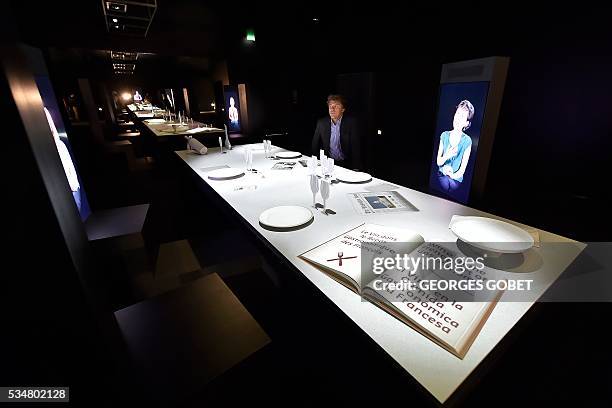 Director of Bordeaux's wine museum Philippe Massol gives explanation about the electronic table in one of the exhibition room of the new structure in...
