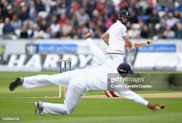 Chris Woakes of England guides the ball past Dimuth Karunaratne of Sri Lanka during day two of the 2nd Investec Test match between England and Sri...