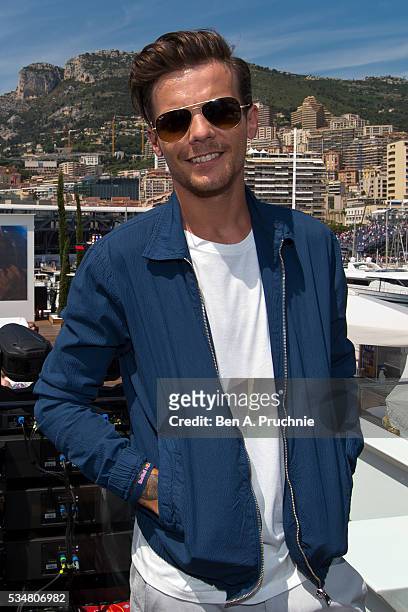 Louis Tomlinson poses for photographs at the Red Bull Racing Energy Station at Monte Carlo on May 28, 2016 in Monaco.