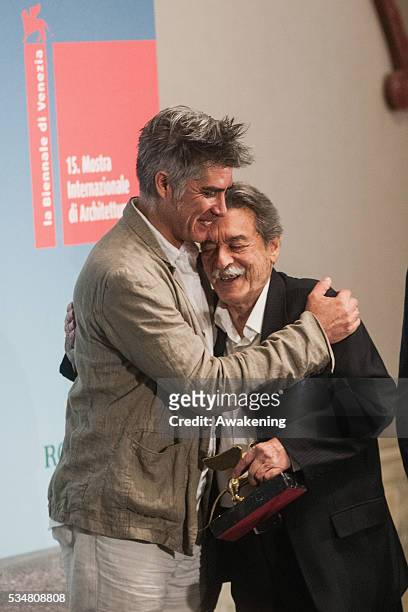 The winner of the Golden Lion for Lifetime Achievement Paulo Mendes da Rocha welcomed by Alejandro Aravena at the official opening ceremony of the...