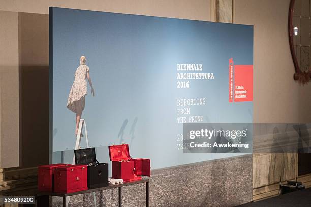 The awards and the official poster of the 15th Biennale of Architecture are seen at the official opening ceremony on May 28, 2016 in Venice, Italy....