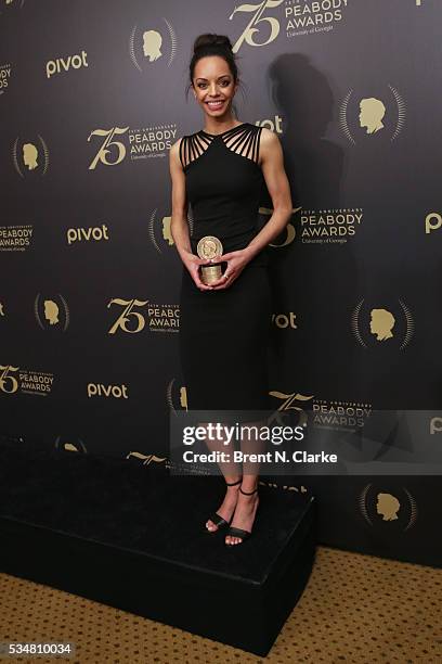 Official recipient for "Secret Mustard Gas Experiments", correspondent Caitlin Dickerson poses for photographs in the press room during the 75th...