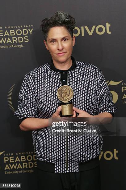 Official recipient for "Transparent", creator/executive producer/director/writer Jill Soloway poses for photographs in the press room during the 75th...