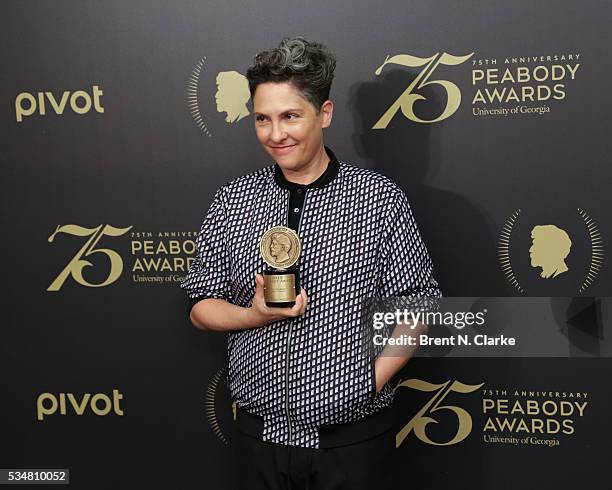 Official recipient for "Transparent", creator/executive producer/director/writer Jill Soloway poses for photographs in the press room during the 75th...