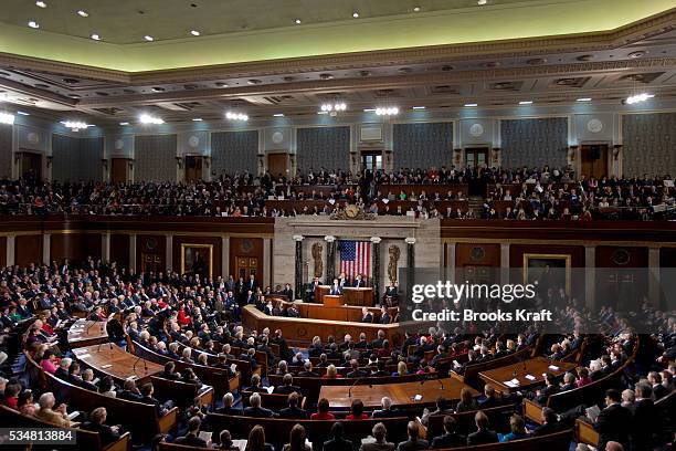 President Barack Obama delivers his speech as Vice President Joe Biden and Speaker of the House John Boehner look on during his State of Union...