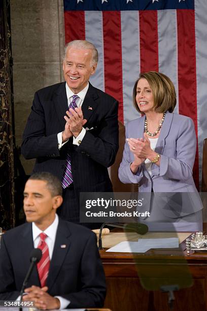 President Barack Obama delivers his State of the Union address, as Vice President Joe Biden and House Speaker Nancy Pelosi applaud, in the U.S....