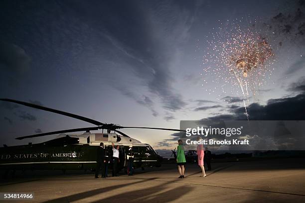 President George W Bush boards Marine One after attending a campaign rally in Sugar Land, Texas. Seeing him off are Senator Kay Bailey Hutchison and...