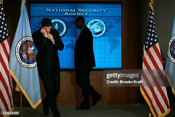 Security personnel outside the National Threat Operations Center at the National Security Agency in Fort Meade, Maryland during a visit by President...