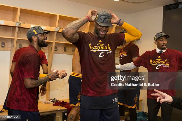 LeBron James of the Cleveland Cavaliers celebrates after a victory in Game Six of the Eastern Conference Finals against the Toronto Raptors during...