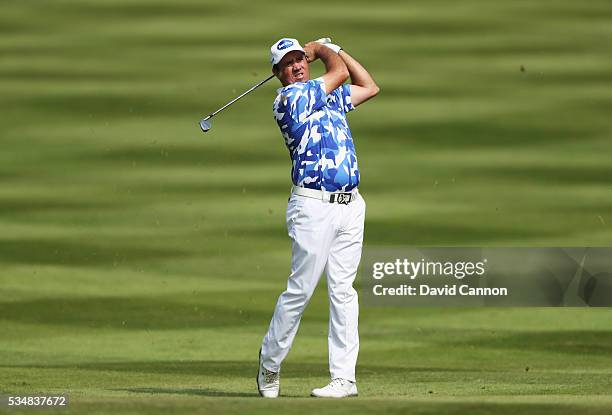 Scott Hend of Australia hits his 2nd shot on the 12th hole during day three of the BMW PGA Championship at Wentworth on May 28, 2016 in Virginia...