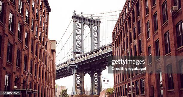 manhattan bridge as seen from brooklyn in new york city - brooklyn - new york stock pictures, royalty-free photos & images