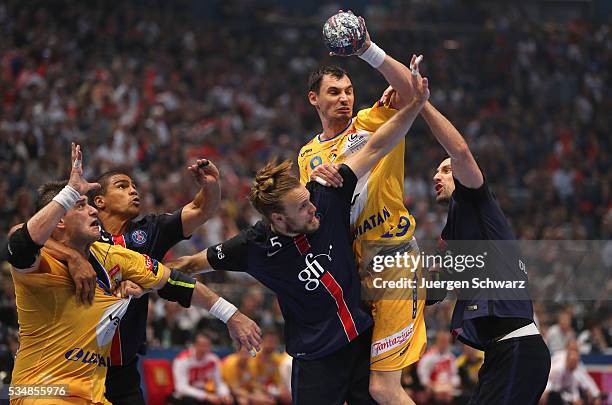 Krzysztof Lijewski of Kielce controls the ball during the first semi-final of the EHF Final4 between VS Tauron Kielce and Paris Saint-Germain on May...