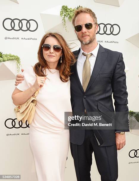 Dervla Kirwan and Rupert Penry-Jones attend day one of the Audi Polo Challenge at Coworth Park on May 28, 2016 in London, England.