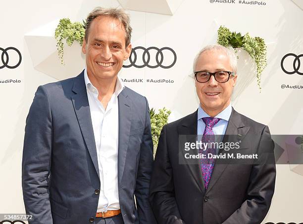 Andre Konsbruck, Director of Audi UK, and Jon Zammett, Head of PR for Audi UK, attend day one of the Audi Polo Challenge at Coworth Park on May 28,...