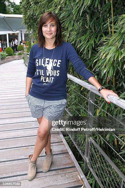 Actress Julie de Bona attends Day Seven of the 2016 French Tennis Open at Roland Garros on May 28, 2016 in Paris, France.