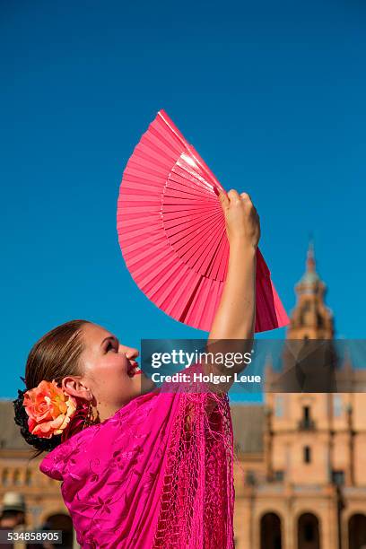 young flamenco dancer holds fan at plaza de espana - fan schal bildbanksfoton och bilder