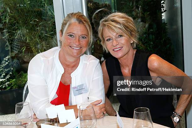 Marina Carrere d'encausse and Sophie Davant attend the 'France Television' Lunch during Day Seven of the 2016 French Tennis Open at Roland Garros on...