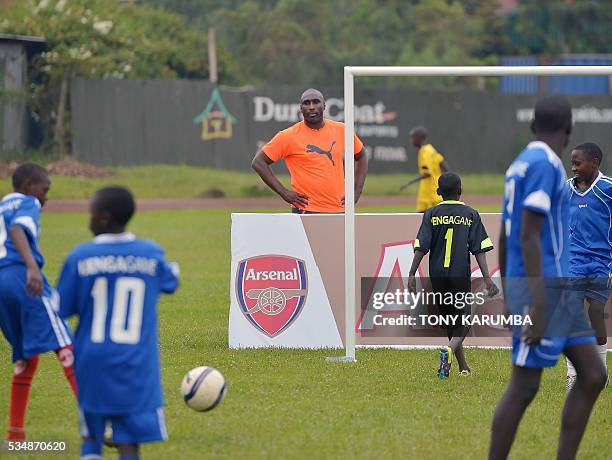 Former Tottenham Hotspur, Arsenal, Newcastle United's football player and England star, British Sulzeer "Sol" Jeremiah Campbell watches young...